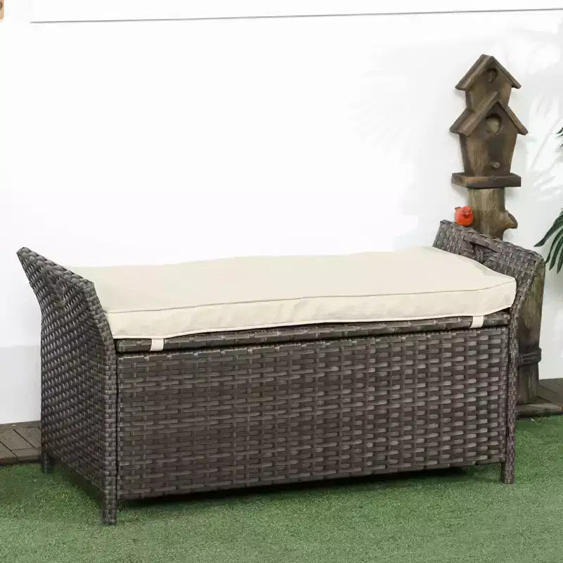 Banc de rangement en osier Outsunny 109 L, mobilier de jardin en rotin PE, pouf rectangulaire 2-en-1 avec poignées et coussin