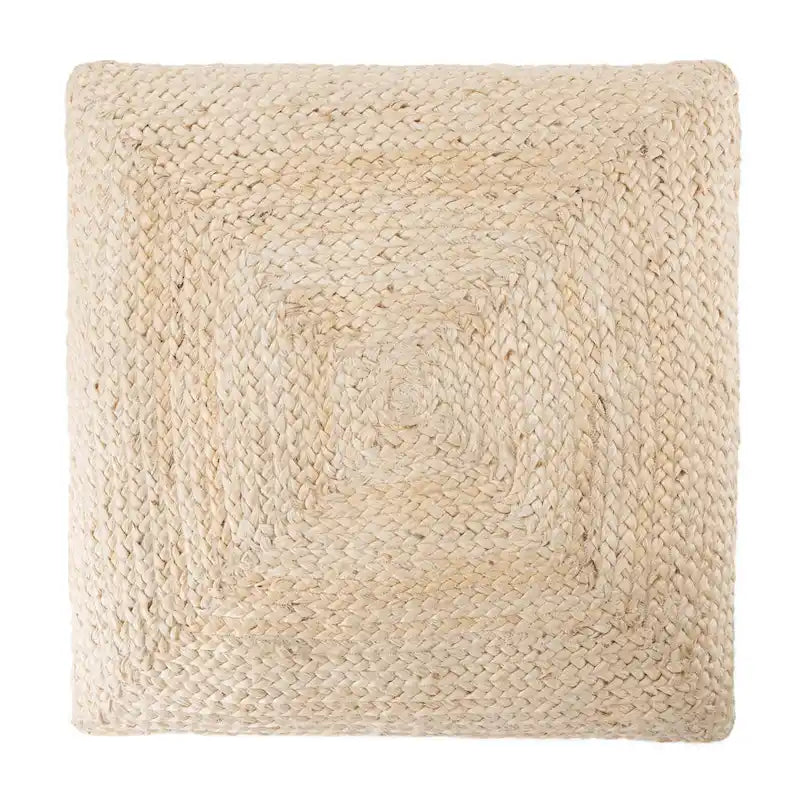 Le pouf/coussin de sol en jute texturé Faxon de Curated Nomad