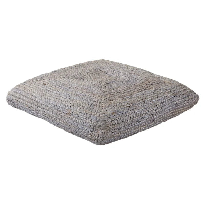 Le pouf/coussin de sol en jute texturé Faxon de Curated Nomad