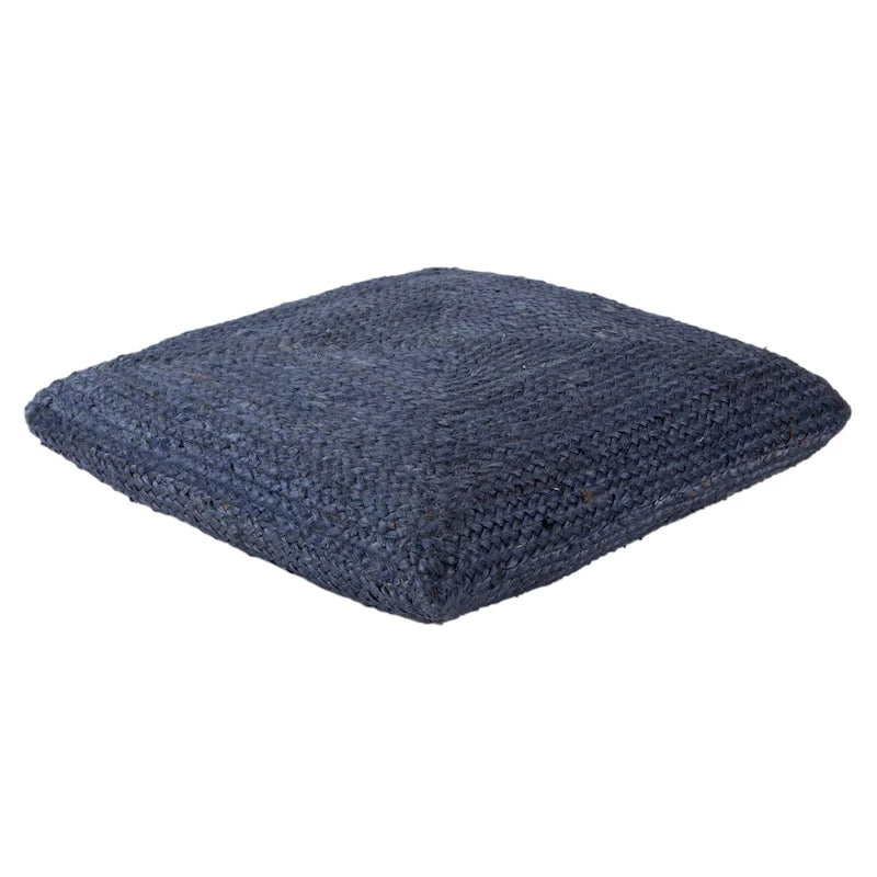 Le pouf/coussin de sol en jute texturé Faxon de Curated Nomad