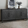 Grande armoire de rangement avec portes sculptées de fleurs et poignées métalliques